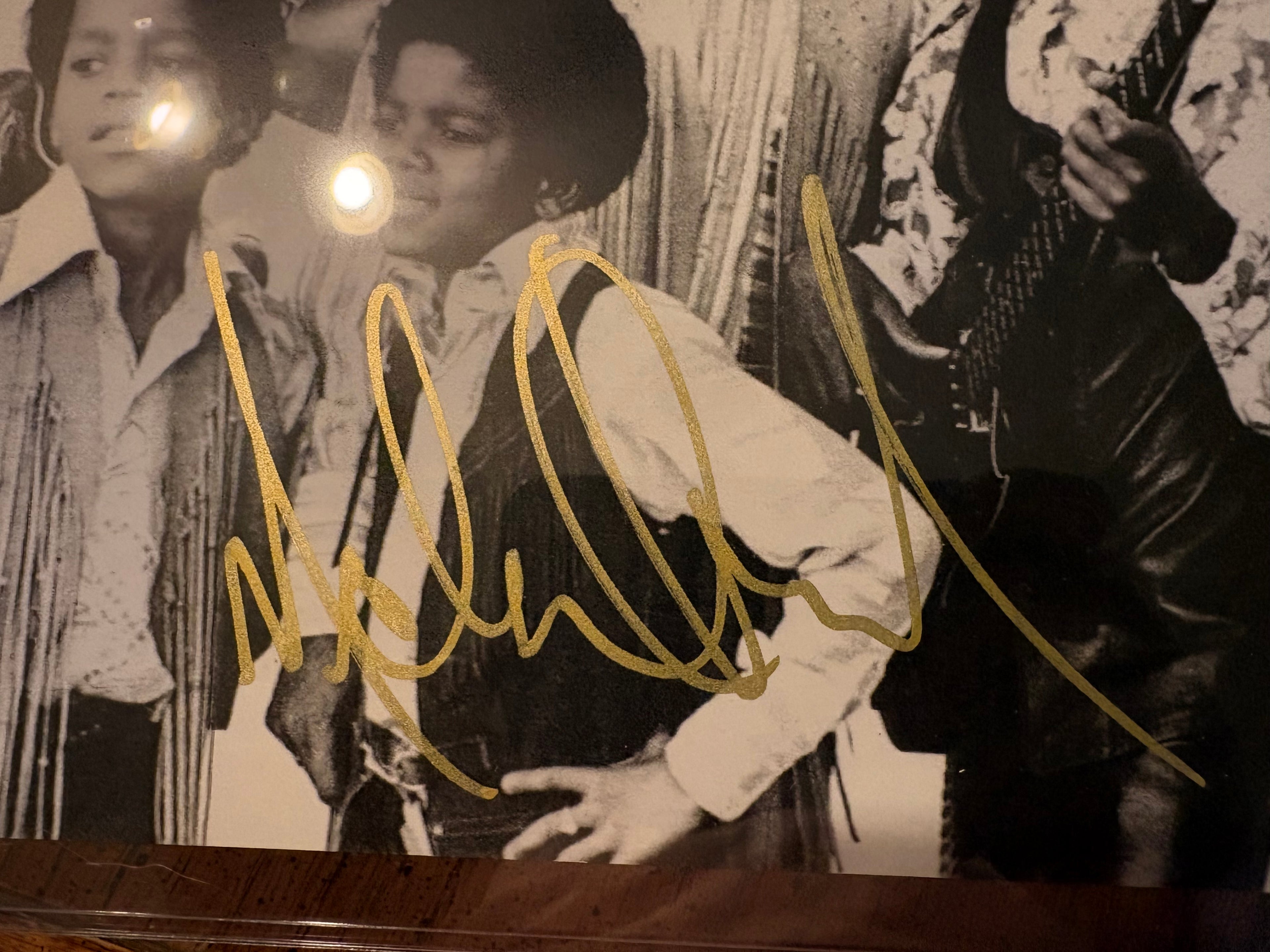 Michael Jackson Autographed Vintage B&W Photo – Gold Paint Pen Signature